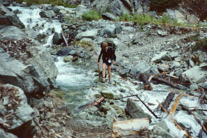 Marj and Micki crossing stream near Waptus Lake